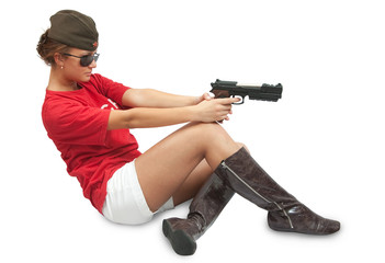 beautiful girl in overseas cap holding gun