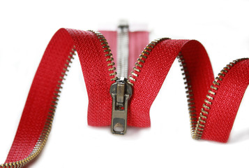 Red zipper on a white background with metal teeths;