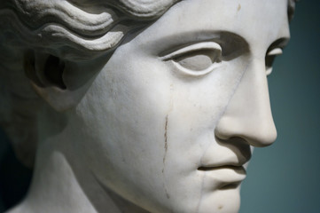 Close-up of the head of a woman statue