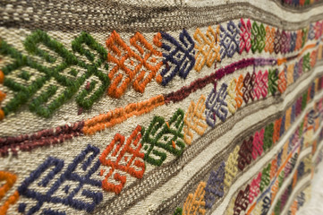 Detail of a decorated wool carpet