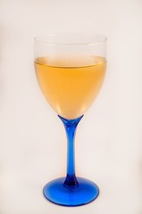 Glass of white wine on a white back ground