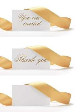 golden ribbon and greeting card on a white background