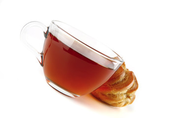 tea and eclair on white