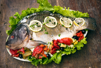 Carp with potato and vegetable