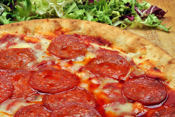 home made italian pizza with salami and cheese