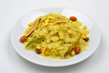 dry roasted chevda on a white plate