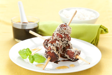 chicken skewer with sesame and soy sauce
