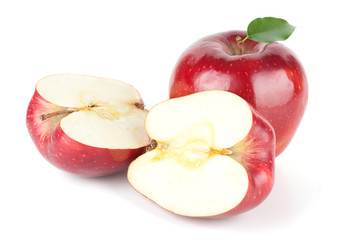 A Ripe Red Apple With Leaf and two halves
