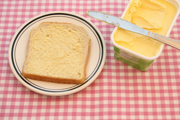 Buttered slice of bread