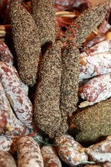 Pepper coated sausages