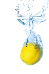 ripe yellow apple falling in the water