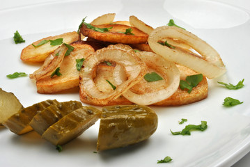 roasted potato with organic onion and gherkin
