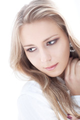 Fototapeta premium Young woman on white background portrait