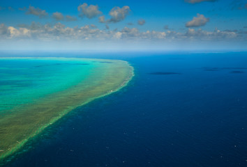 Sunny Aerial View of Arlington Reef in Great Barrier Reef