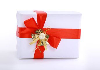 gift box wrapped with red ribbon with big bow isolated.