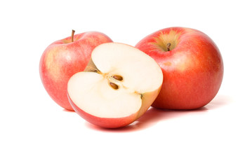 Two whole and half of apples
