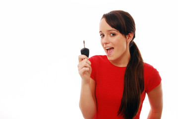 Happy girl holding car key
