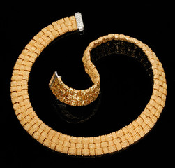 Golden bracelet with diamonds