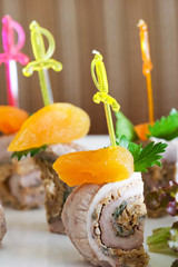 Smoked meat roulade canape, spinach stuffing