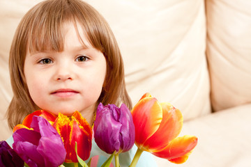 Obraz na płótnie Canvas girl with tulips