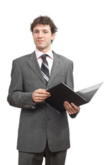 Smiling businessman holding document folder