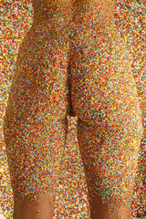 a beautiful womans figure covered in 100s and 1000s.