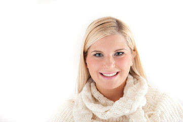 Young happy winter woman in knit clothes