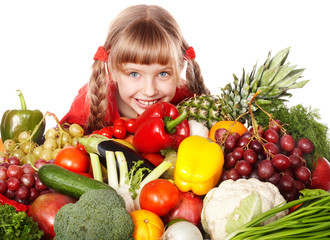 Fototapeta na wymiar Child girl with group of vegetable and fruit. Isolated.