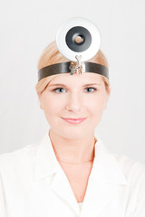 Young female doctor with medical tool