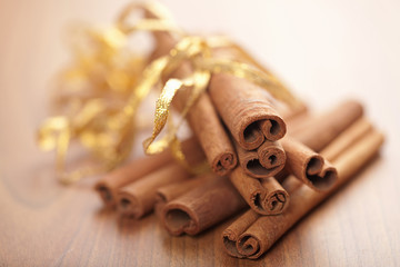 cinnamon with golden ribbon