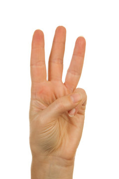 Hand is counting number 3 over white background