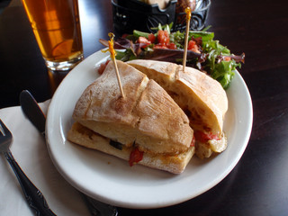 Healthy vegetarian sandwich with a salad and Ice tea