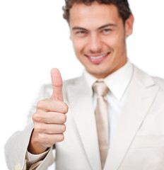 Close-up of a smiling businessman with thumb up
