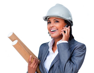 Smiling architect on phone wearing a hardhat