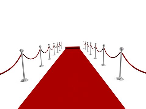 Red carpet rolling into distance