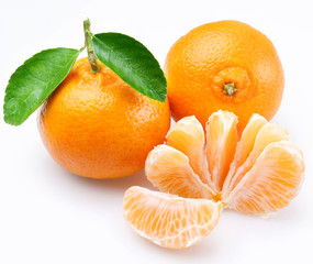 Tangerine with segments on a white background