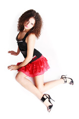 Naklejka premium Sexy girl in red skirt on white background