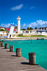old tilted and new lighthouses in Puerto Morelos, Mexico