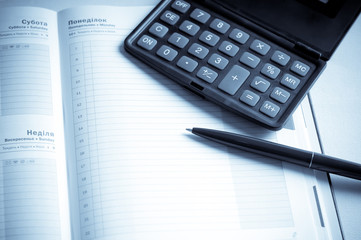 organizer and pen toned blue