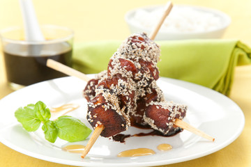 chicken skewer with sesame and soy sauce