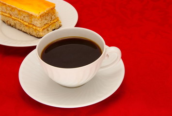 Coffee cup over red background