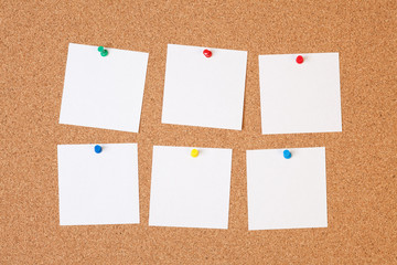 paper notes on cork board