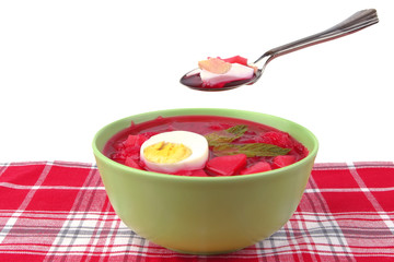 red vegetable soup with spoon