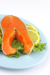 salmon steak on blue dish