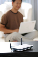 Home wireless internet - focus on the router - obrazy, fototapety, plakaty