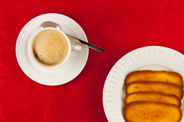 Coffee and cookies on a red background