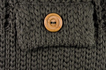 Pocket with a wooden button