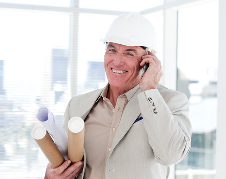 Close-up Of A Senior Architect On Phone