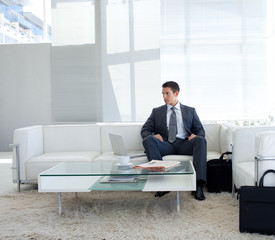 Fototapeta premium Businessman sitting in a waiting room