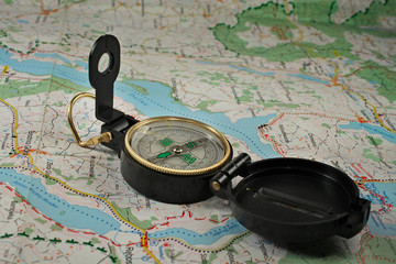 Fototapeta na wymiar Compass on the detailed map